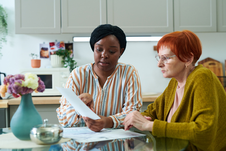 Social Worker helping senior woman