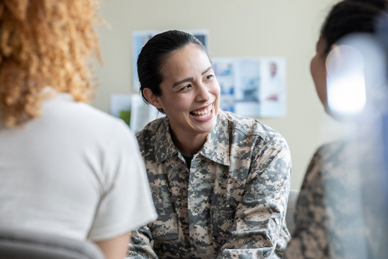 military social worker in session with others