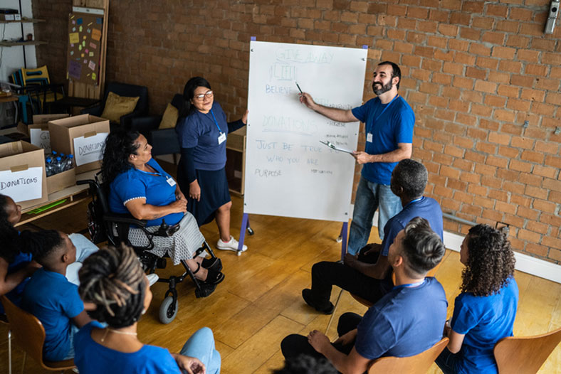 nonprofits volunteers in meeting